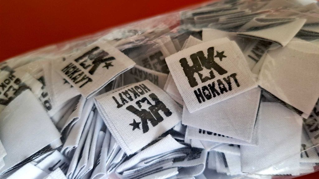 The Woven Label with the logo of the Nokaut band.